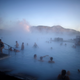 People relax in a hot spring near the town of Grindavik, Iceland.